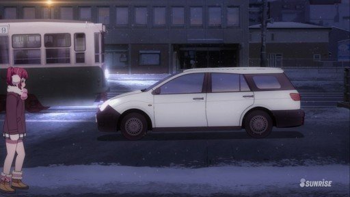 In front of the bank on the slope